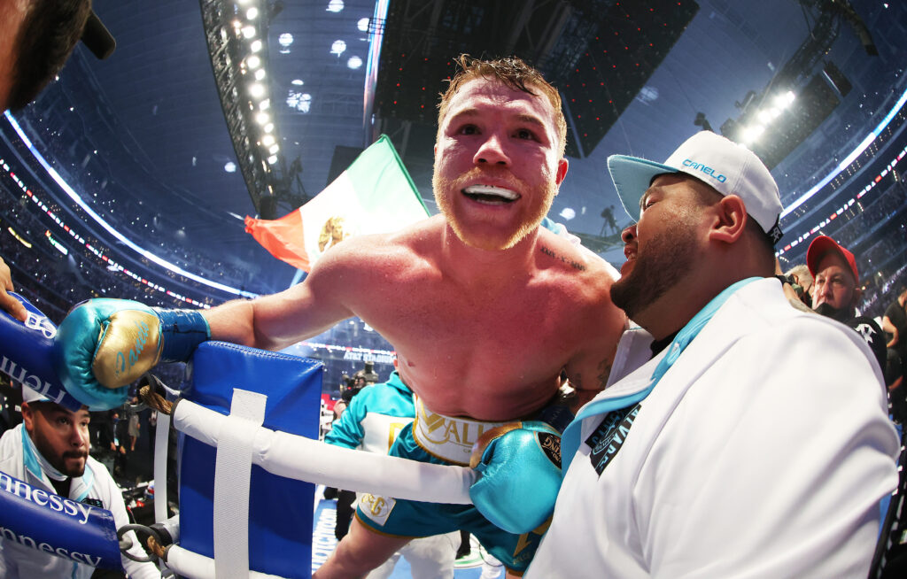 Canelo Alvarez celebrates after his stoppage win over Billy Joe Saunders in their 2021 super middleweight title fight in Texas.