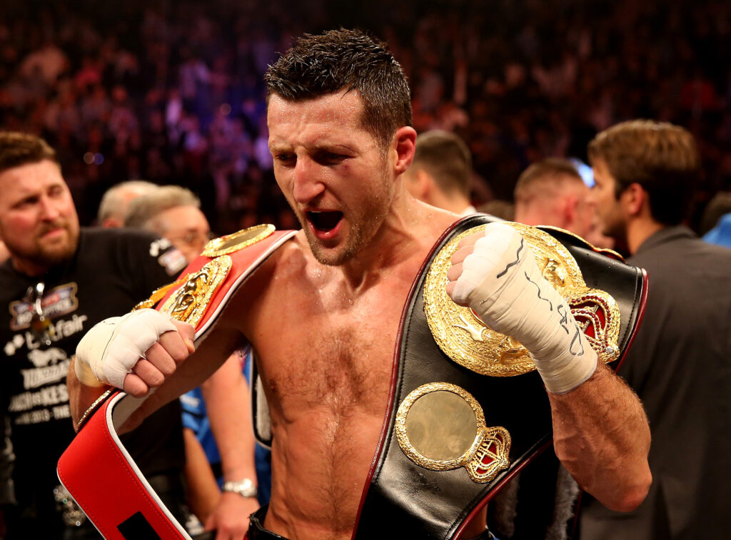 Carl Froch celebrates after his IBF and WBA championship wins over Mikkel Kessler at The O2 Arena in 2013