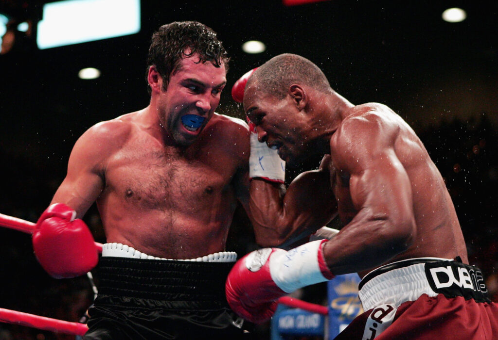Oscar De La Hoya fights Bernard Hopkins in the ring during their 2004 title fight at the MGM Grand in Las Vegas, Nevada