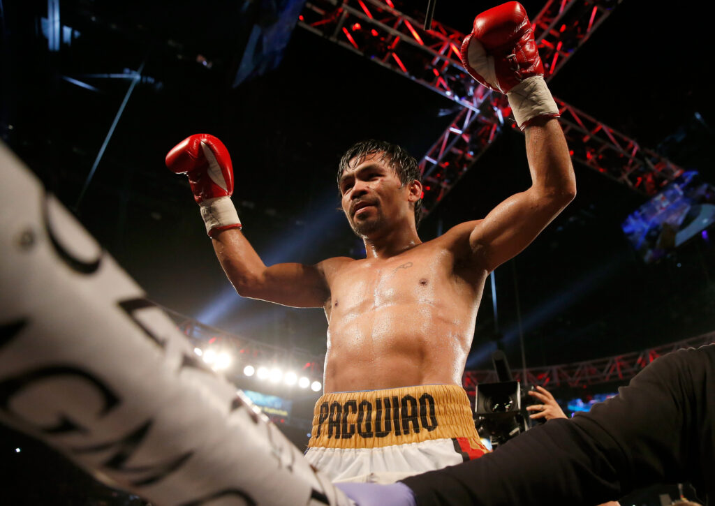 Manny Pacquiao celebrates after his decision win over Timothy Bradley in their 2016 welterweight title fight