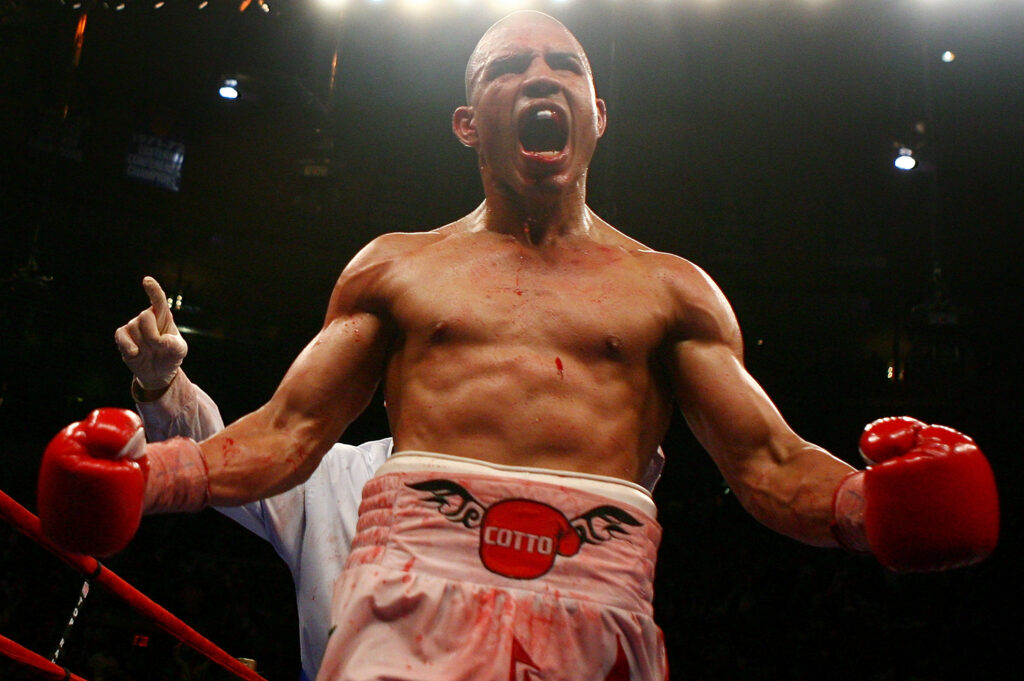 Miguel Cotto celebrates during his fight with Zab Judah at Madison Square Garden in 2007