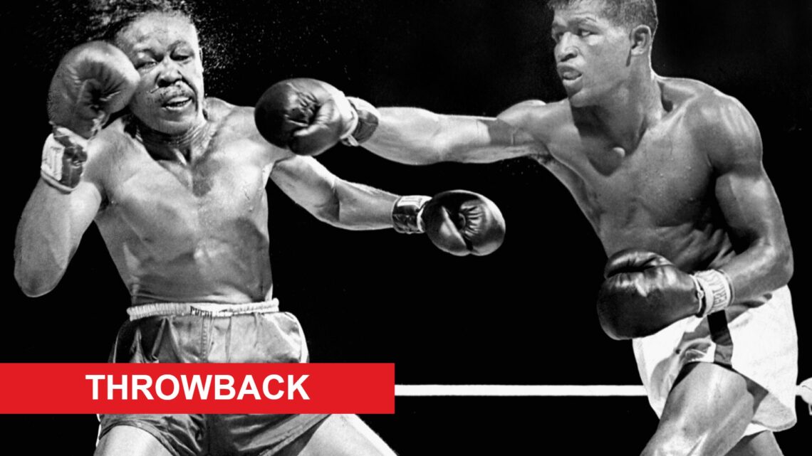 Sugar Ray Robinson punches Kid Gavilan with a right hand